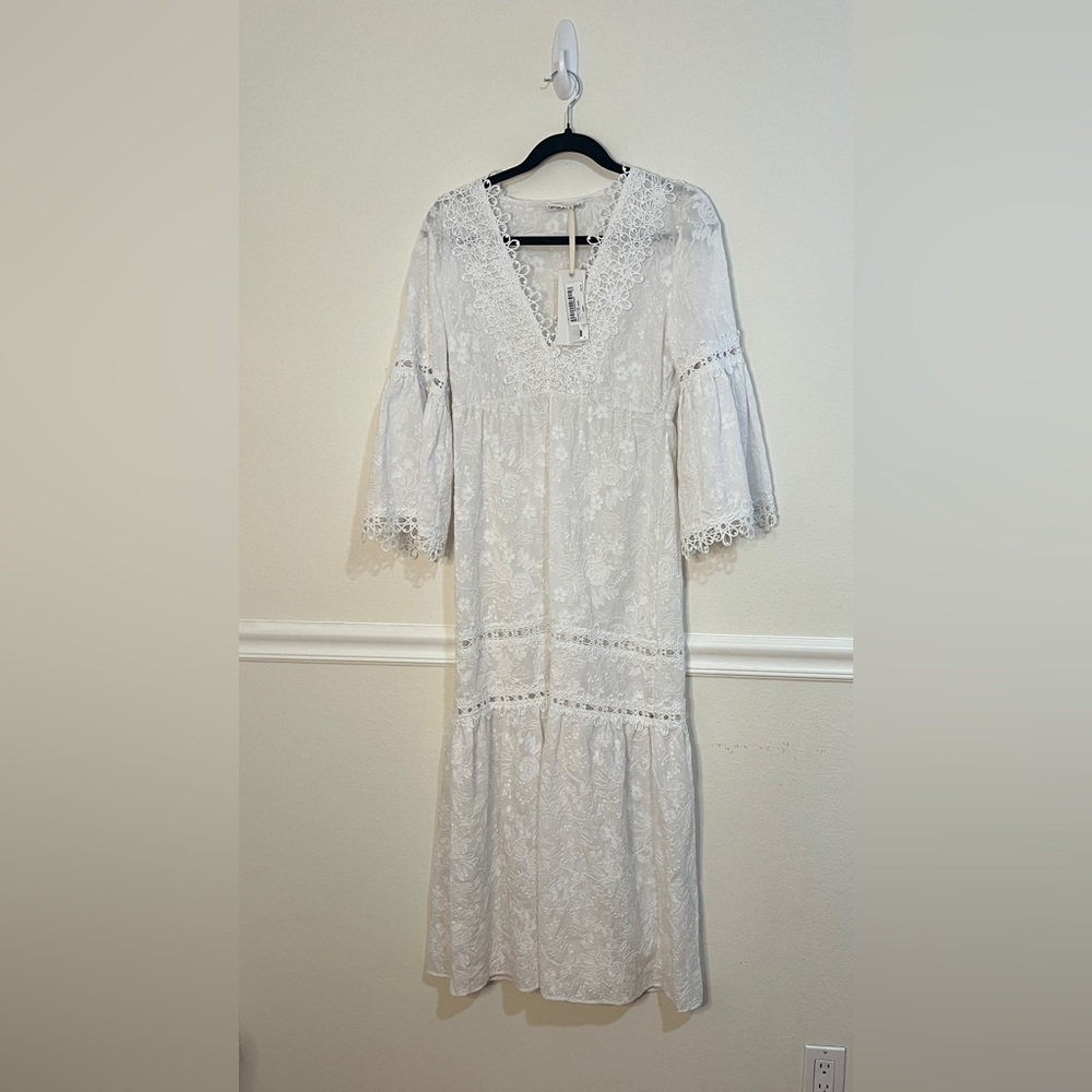 Rafaela D’Angelo. White boho or beach maxi dress.